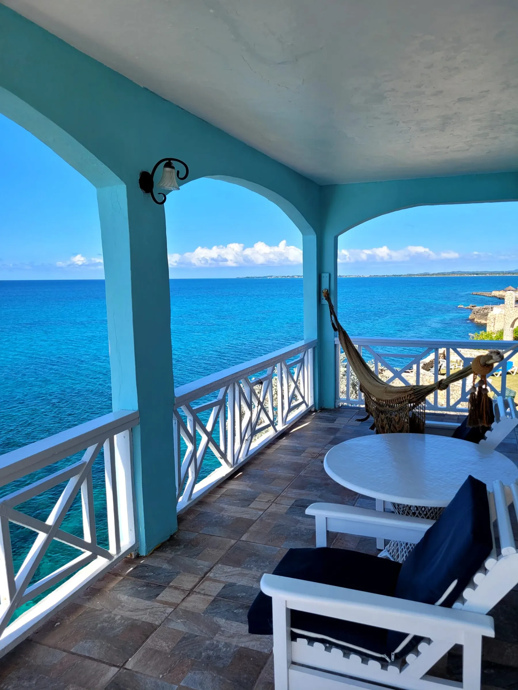 Hammock on a balcony over the Caribbean Sea