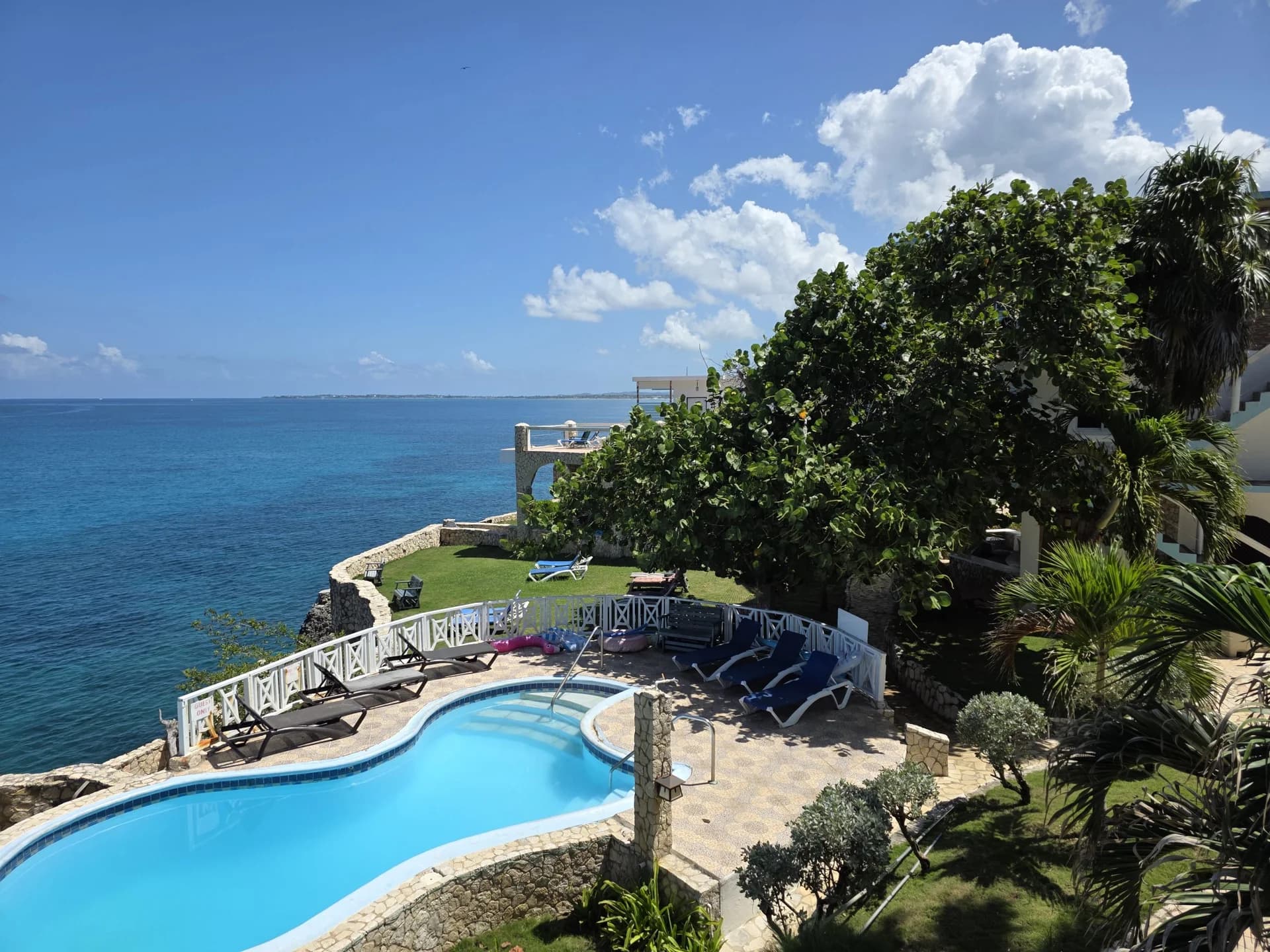 Balcony view along the West End coastline from Seaview Deluxe Room 10