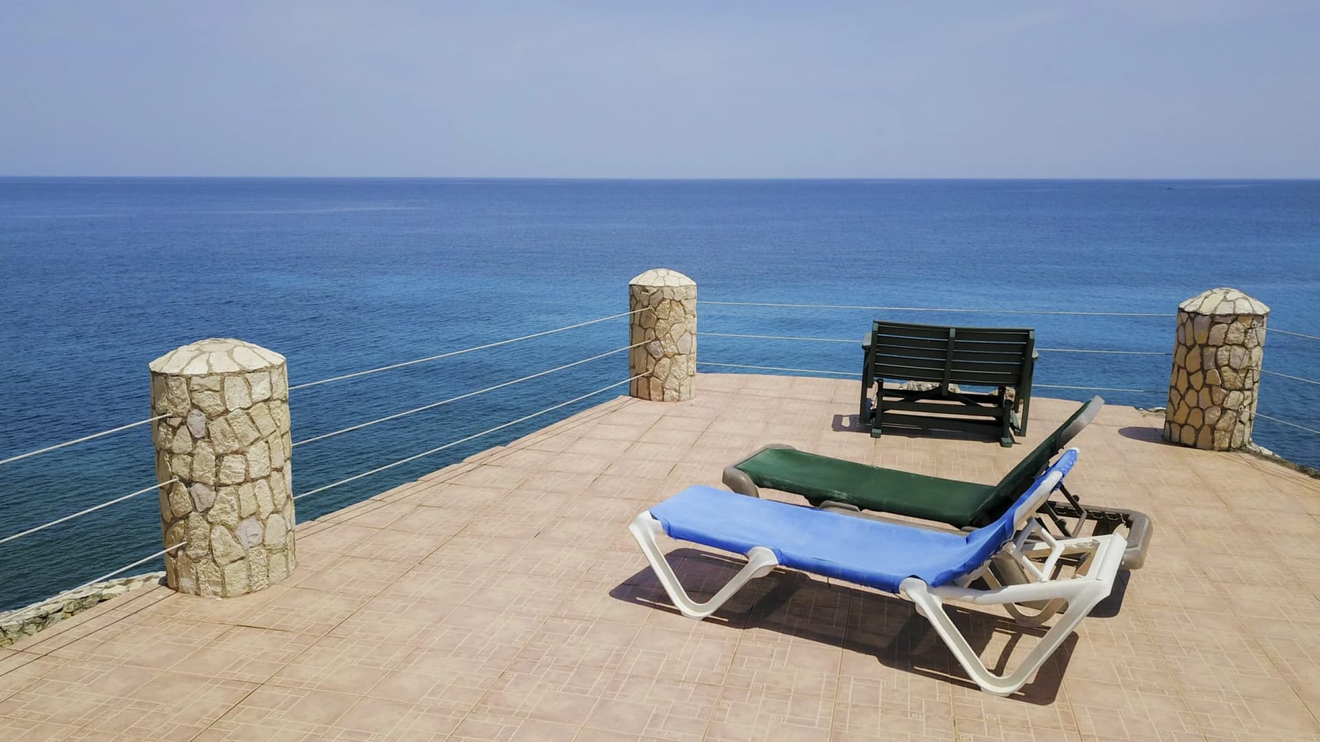 Loungers on the private sea-view terrace of the Seaview Suite, Room 13